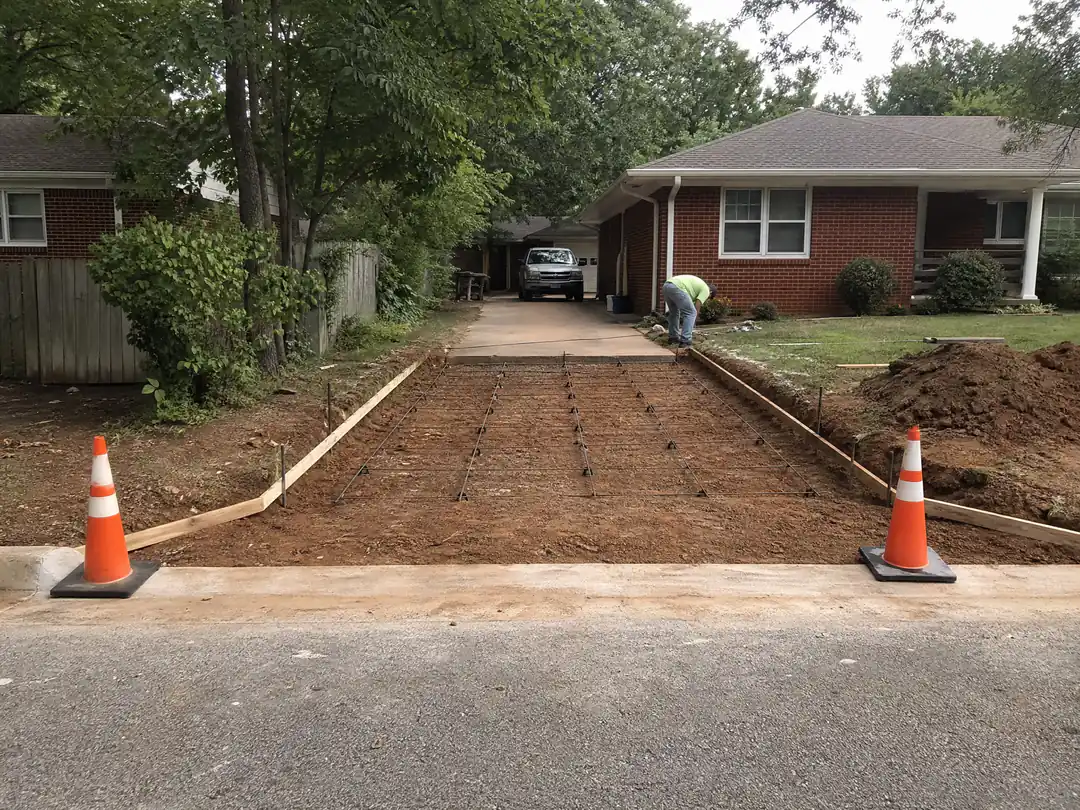 Driveway apron formed and reinforced at the street curb, ready for concrete, in an older Oklahoma City neighborhood